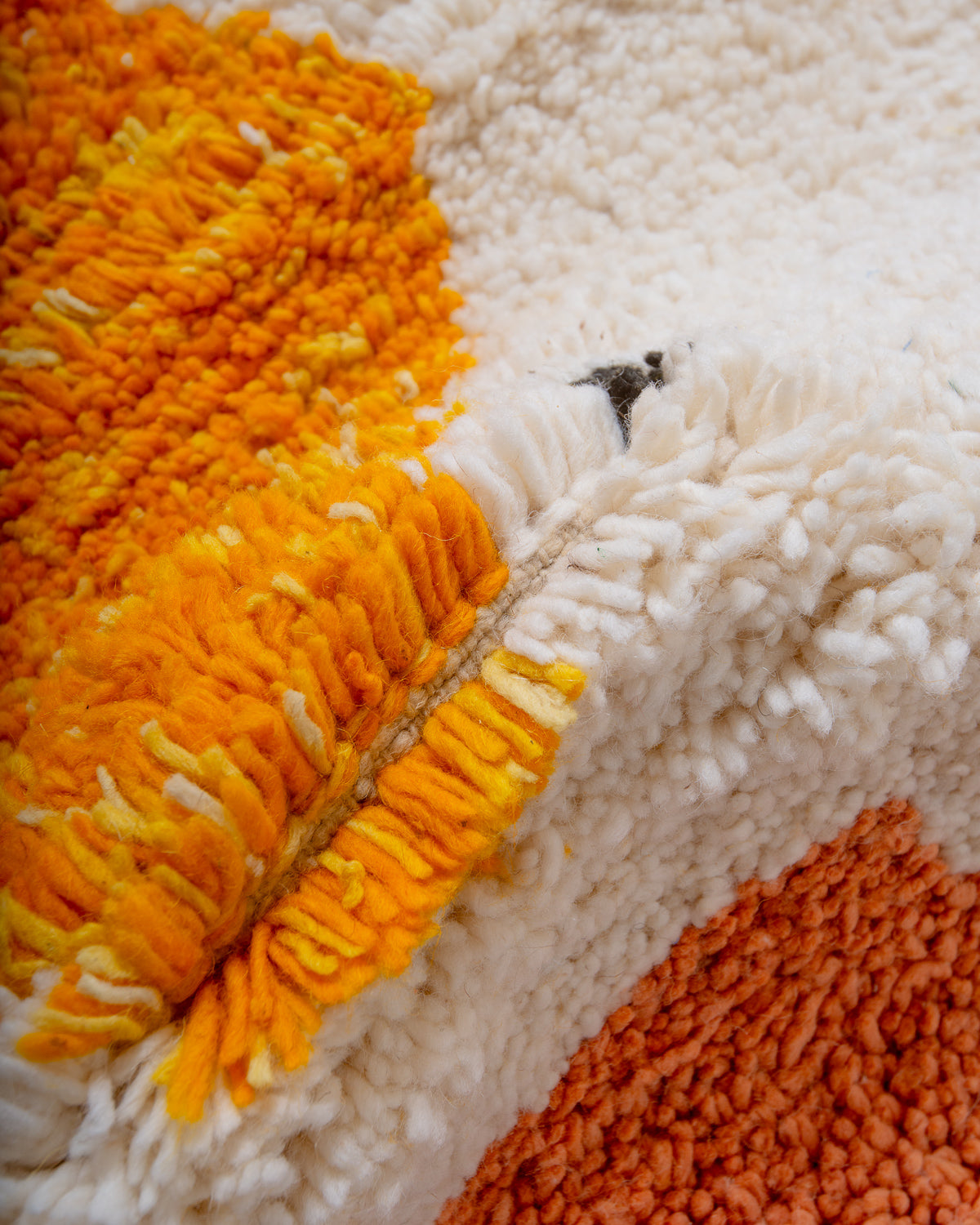 Modern, designer, handcrafted Berber rug from Morocco. Beniourain carpet with beautiful colours and patterns and fluffy wool texture.